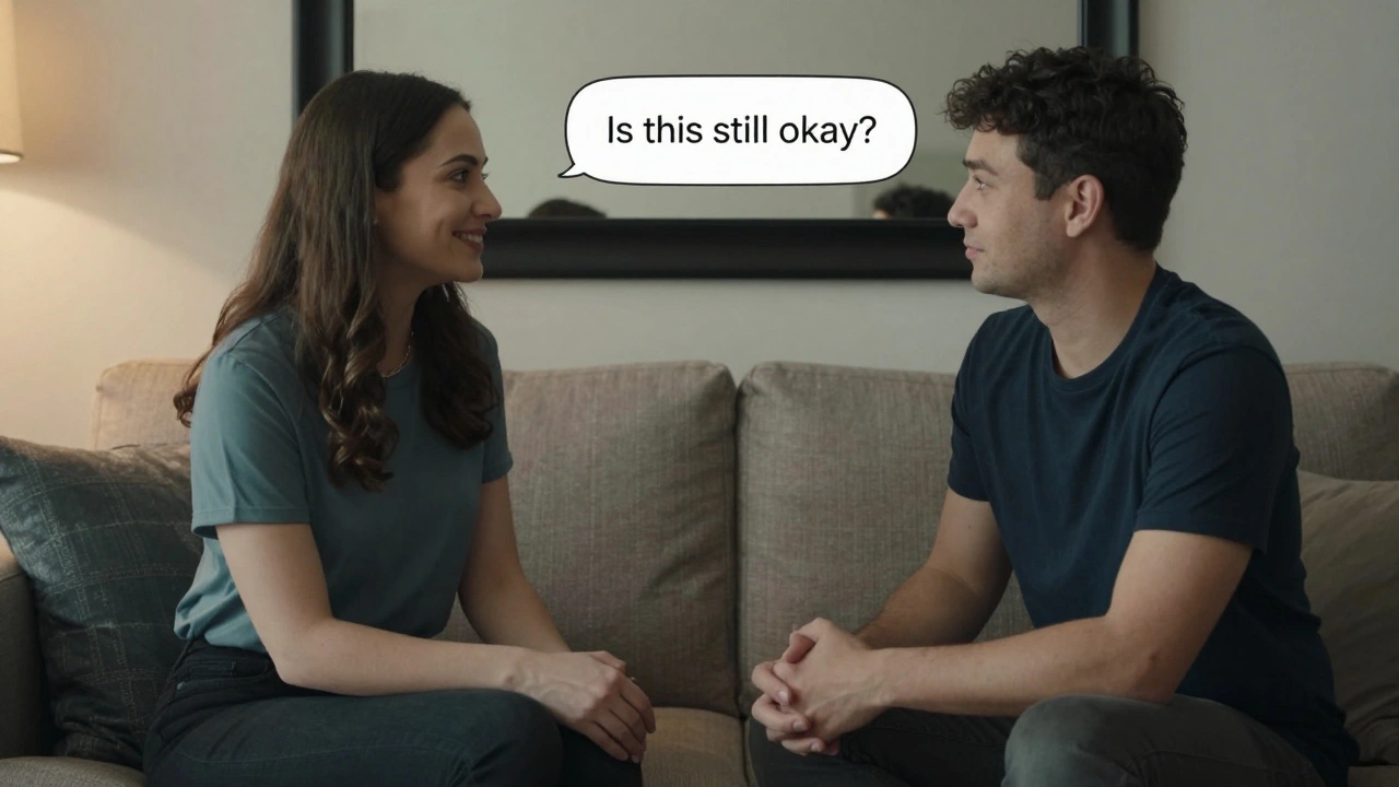 Escort and client having a calm verbal check-in on a sofa, respecting personal space.