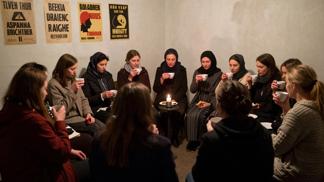 Group of women sharing tea in quiet basement meeting, symbols of solidarity on the walls.